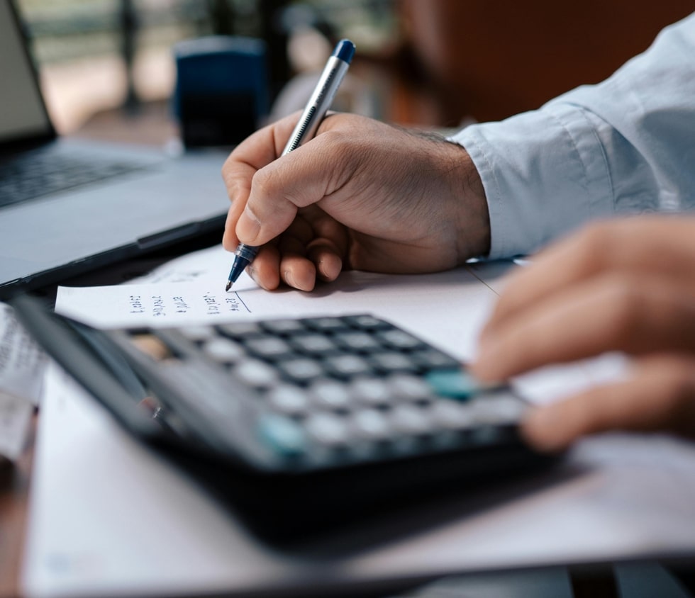 Person calculating debts