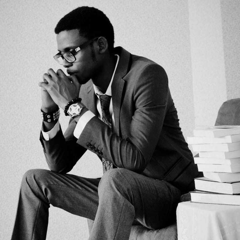 Person contemplating student loan debt