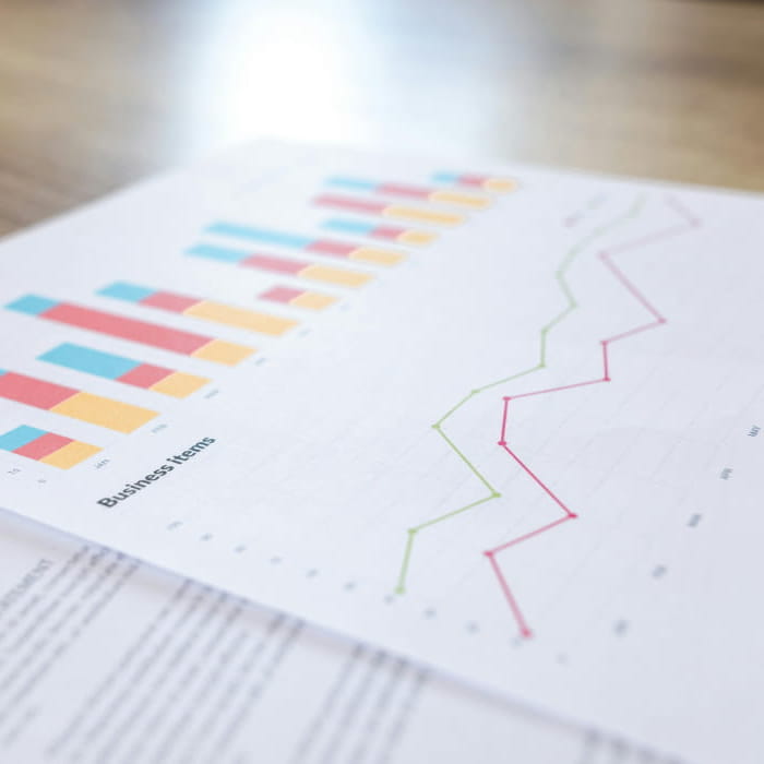 Person examining growing savings by credit improvement