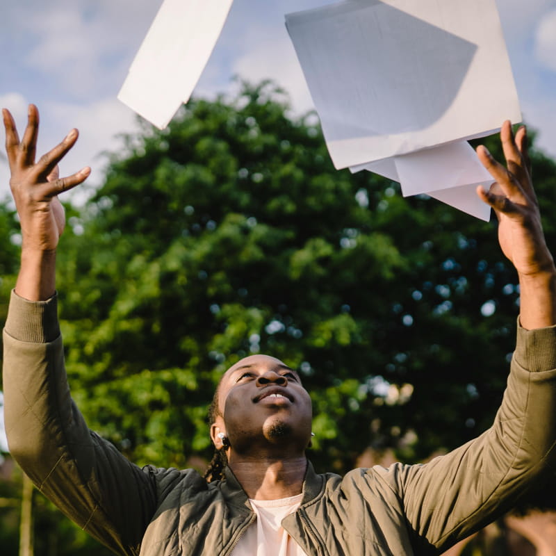 Person feeling free from student loan debt